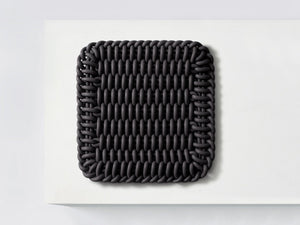 Ergonomic Shore Rug handmade from durable silicone cord suitable for both indoors and outdoors.