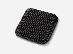 Ergonomic Shore Rug handmade from durable silicone cord suitable for both indoors and outdoors.
