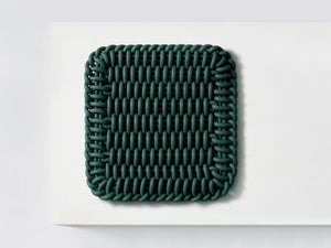 Ergonomic Shore Rug handmade from durable silicone cord suitable for both indoors and outdoors.