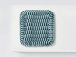 Ergonomic Shore Rug handmade from durable silicone cord suitable for both indoors and outdoors.