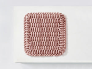 Ergonomic Shore Rug handmade from durable silicone cord suitable for both indoors and outdoors.