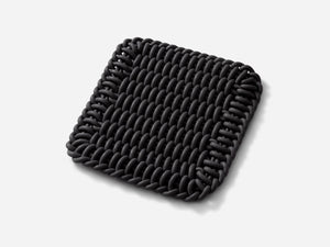 Ergonomic Shore Rug handmade from durable silicone cord suitable for both indoors and outdoors.