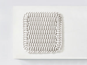 Ergonomic Shore Rug handmade from durable silicone cord suitable for both indoors and outdoors.