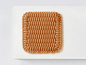Ergonomic Shore Rug handmade from durable silicone cord suitable for both indoors and outdoors.