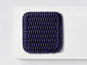 Ergonomic Shore Rug handmade from durable silicone cord suitable for both indoors and outdoors.