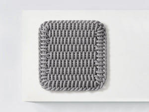 Ergonomic Shore Rug handmade from durable silicone cord suitable for both indoors and outdoors.