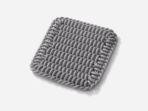 Ergonomic Shore Rug handmade from durable silicone cord suitable for both indoors and outdoors.