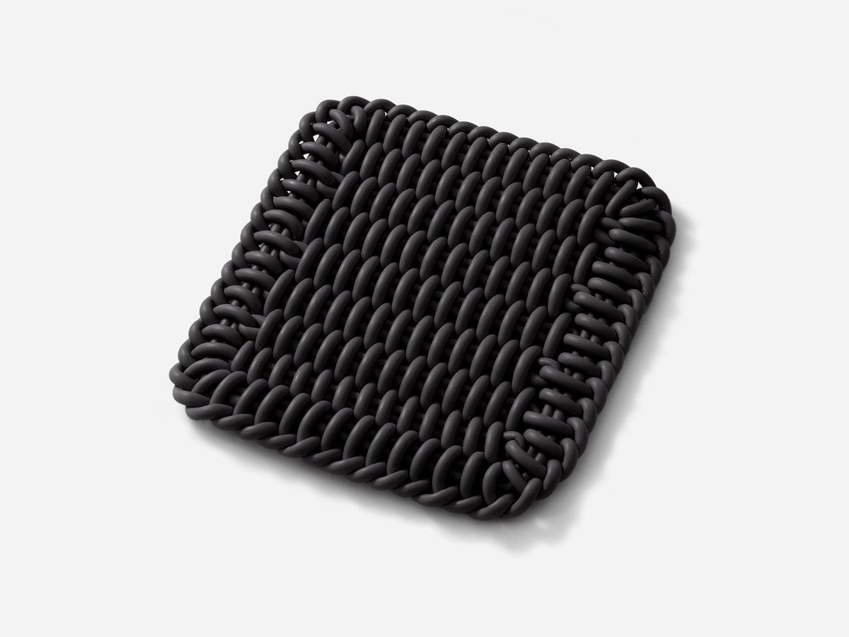 Ergonomic Shore Rug handmade from durable silicone cord suitable for both indoors and outdoors. 
