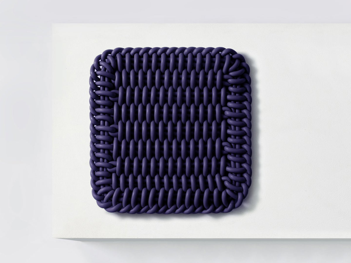 Ergonomic Shore Rug handmade from durable silicone cord suitable for both indoors and outdoors. 