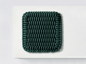 Ergonomic Shore Rug handmade from durable silicone cord suitable for both indoors and outdoors. 