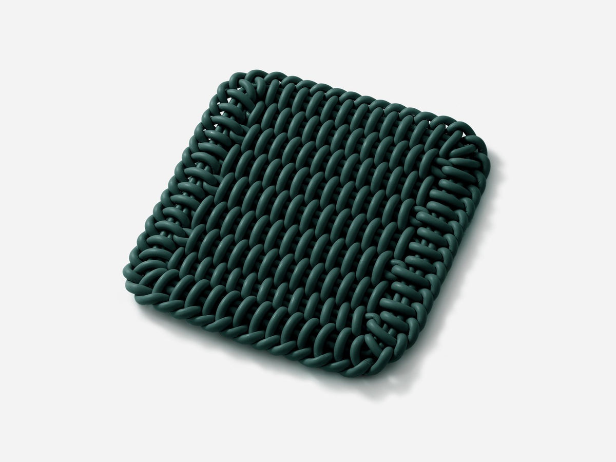 Ergonomic Shore Rug handmade from durable silicone cord suitable for both indoors and outdoors. 