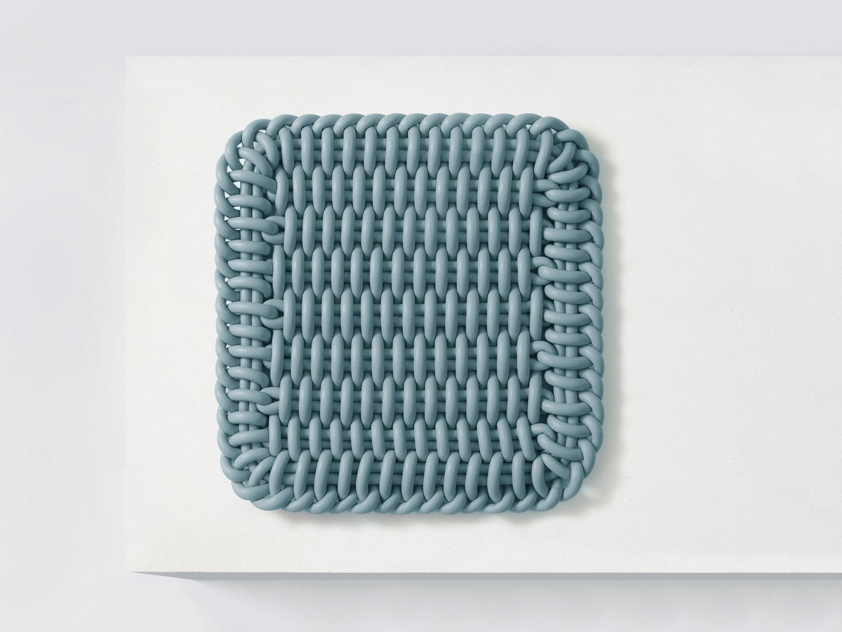 Ergonomic Shore Rug handmade from durable silicone cord suitable for both indoors and outdoors. 
