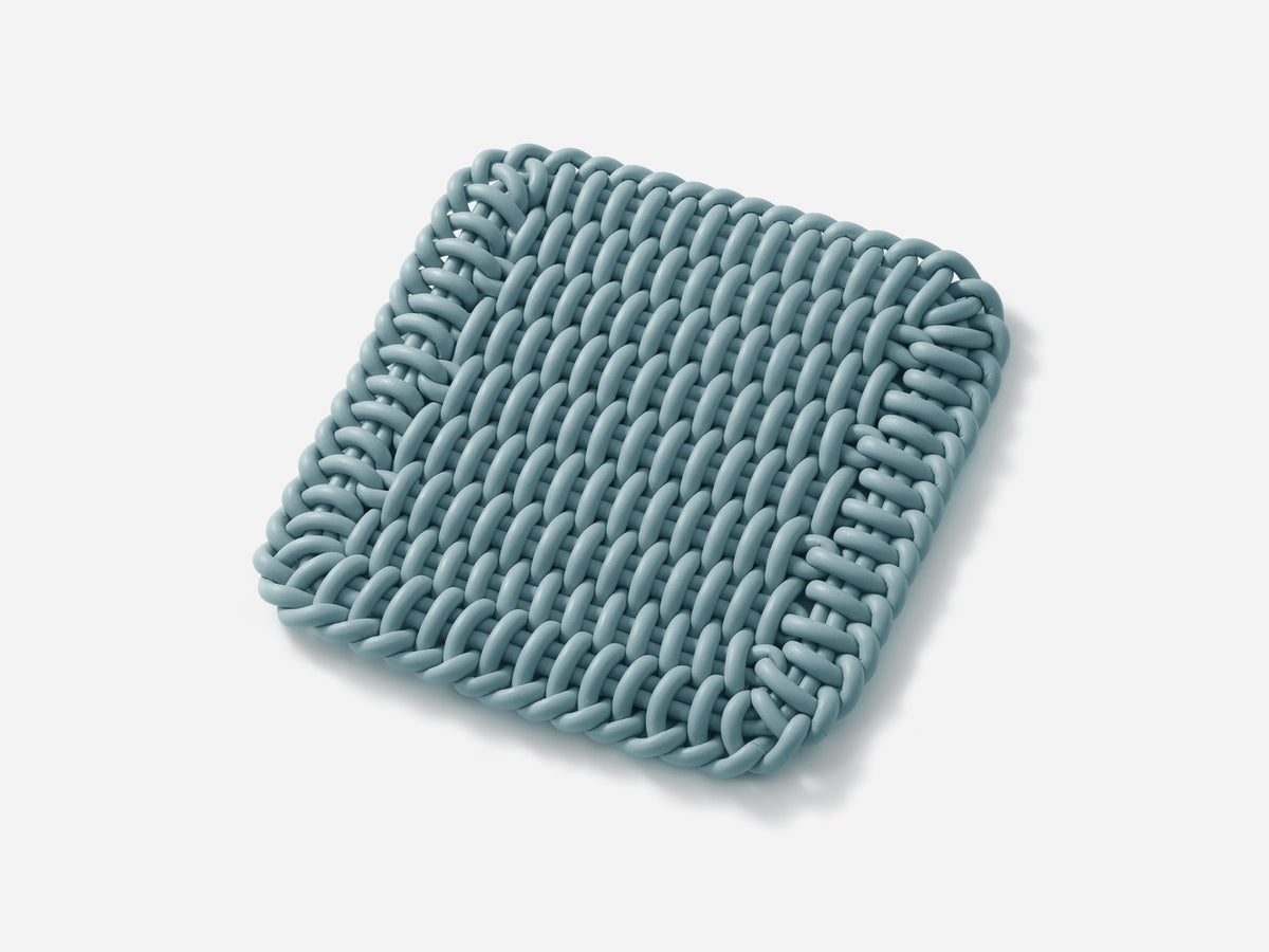 Ergonomic Shore Rug handmade from durable silicone cord suitable for both indoors and outdoors. 