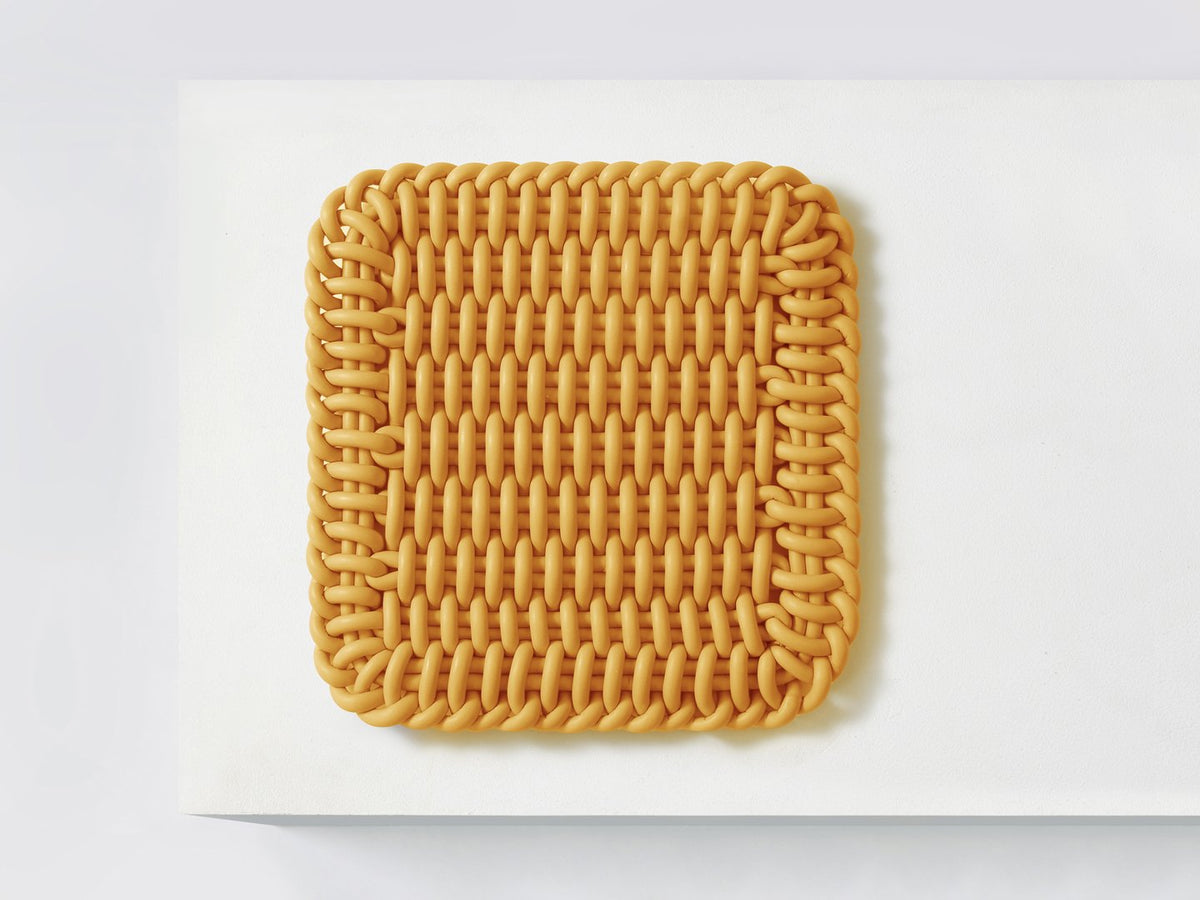 Ergonomic Shore Rug handmade from durable silicone cord suitable for both indoors and outdoors. 