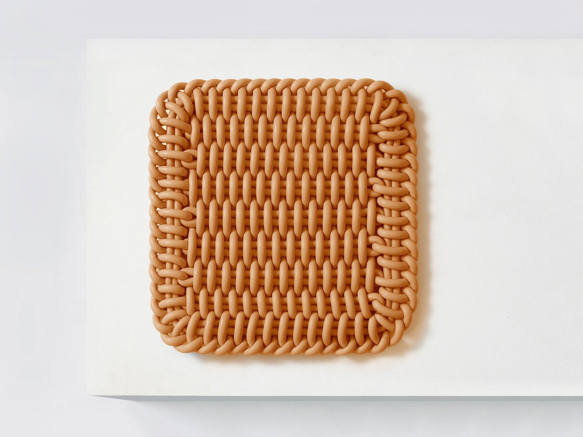 Ergonomic Shore Rug handmade from durable silicone cord suitable for both indoors and outdoors. 